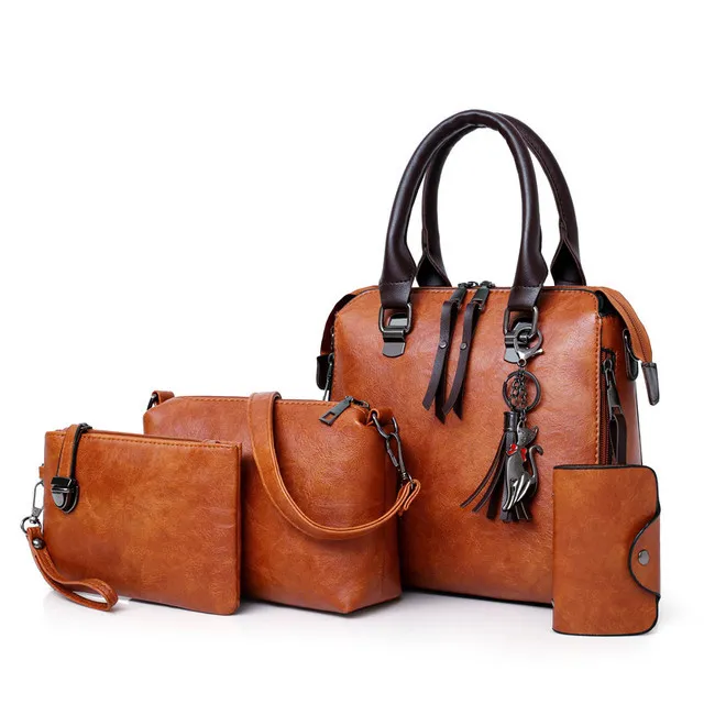 Kit Premium em Couro Nobre - Bolsa + Carteira + Carteira de Mão + Necessaire de Brinde